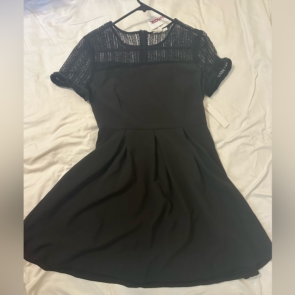 Black dress, lace top with velvet cuff on the sleeve. Never worn. TJ max tag